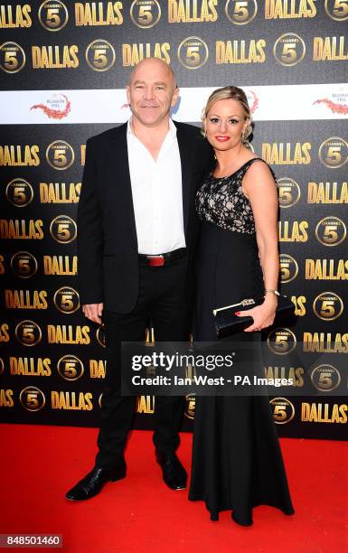 Dominic Littlewood and an unidentified woman arrive at the Channel 5 Dallas launch party at Old Billinsgate in London.