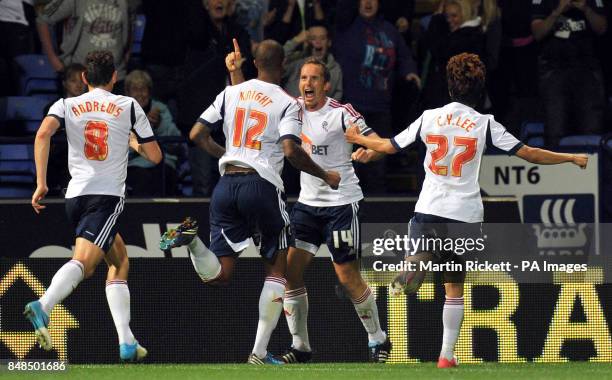 Bolton Wanderers Kevin Davies celebrates scoring his sides opening goal during the npower Football League Championship match at the Reebok Stadium,...