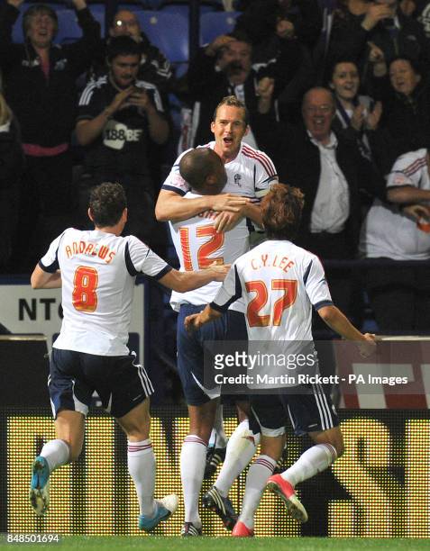 Bolton Wanderers Kevin Davies celebrates celebrates scoring his sides opening goal during the npower Football League Championship match at the Reebok...