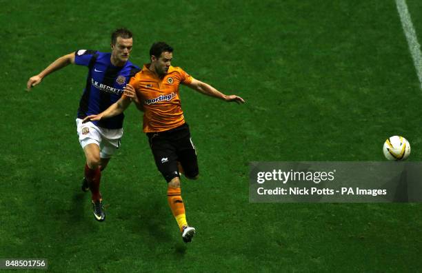 Wolverhampton Wanderers' Matthew Jarvis holds off challenge from Barnsley's Scott Wiseman during the npower Football League Championship match at the...