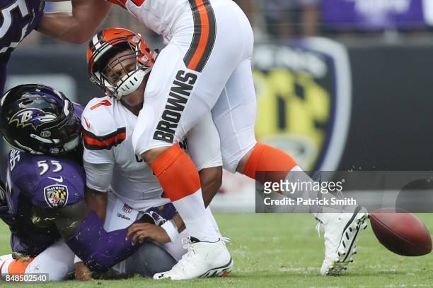 Outside linebacker Terrell Suggs of the Baltimore Ravens tackles quarterback DeShone Kizer of the Cleveland Browns in the first quarter at M&T Bank...