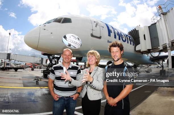 Glasgow Warriors' Gregor Townsend and Peter Horne and Glasgow Airport's Amanda McMillan during the sponsorship announcement at Glasgow Airport.