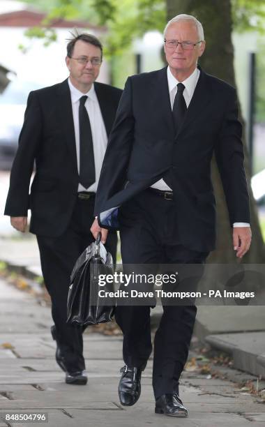 Sports promoter Barry Hearn , arrives at Pudsey Parish Church in West Yorkshire for the funeral of former darts commentator Sid Waddell.