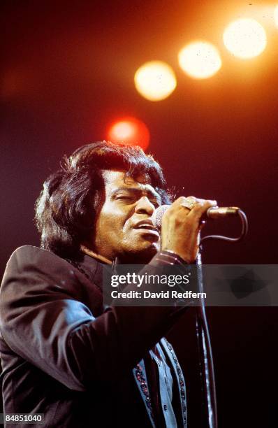 American soul singer and songwriter James Brown performs live on stage at Wembley Arena in London in April 1986.