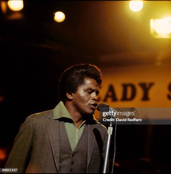 American soul singer and songwriter James Brown performs live on stage with The Famous Flames on the set of the Associated Rediffusion Television pop...
