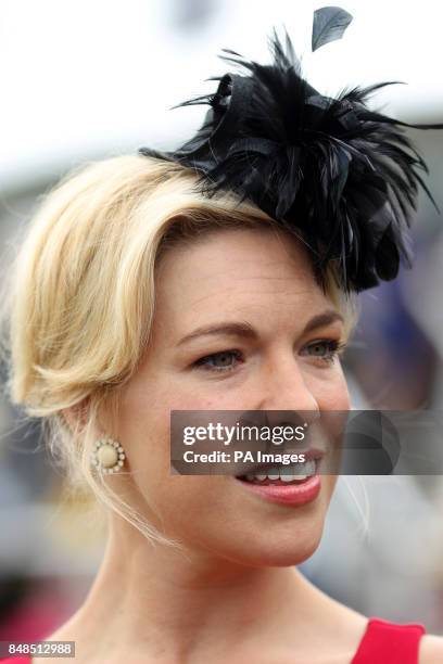 Fashionable female racegoer at Goodwood Racecourse