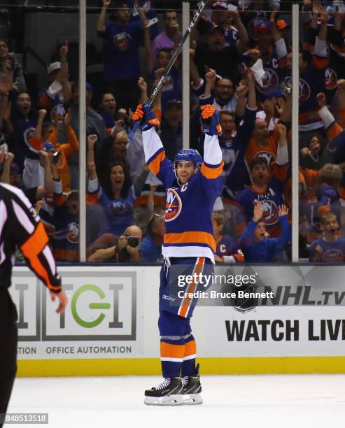 John Tavares of the New York Islanders celebrates his game winning goal at 34 seconds of overtime against the Philadelphia Flyers during a preseason...