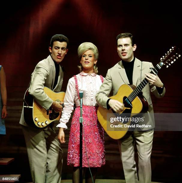 English pop folk group The Springfields, featuring from left, Mike Hurst, Dusty Springfield and Tom Springfield, perform together on a television...