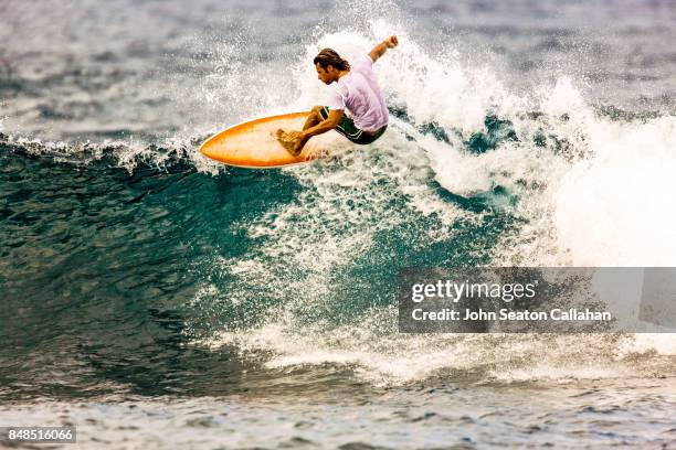 surfing in anjouan island - anjouan island stock pictures, royalty-free photos & images