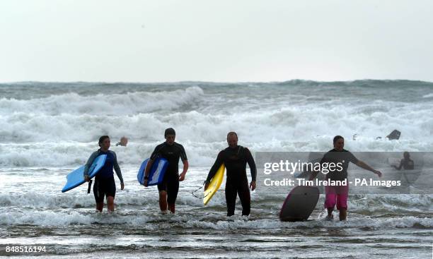 Bodyboarders on Croyde beach during the Bank Holiday weekend.