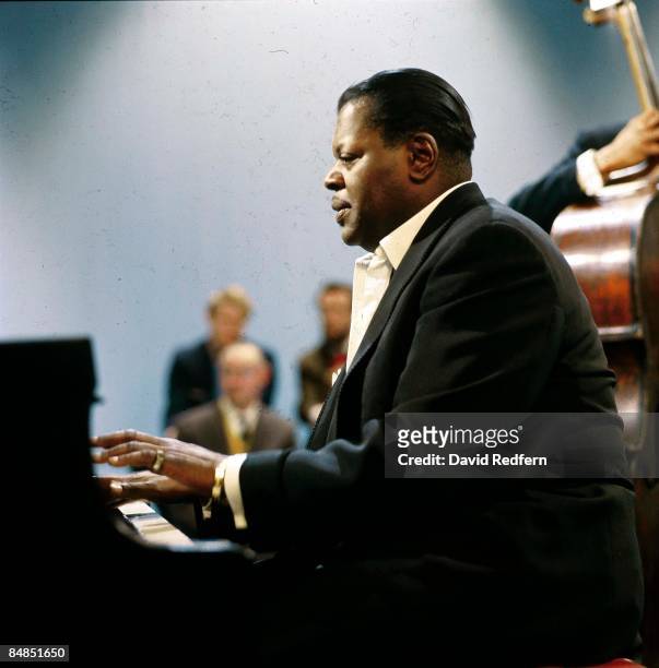 Canadian pianist Oscar Peterson performs on a television show circa 1965.