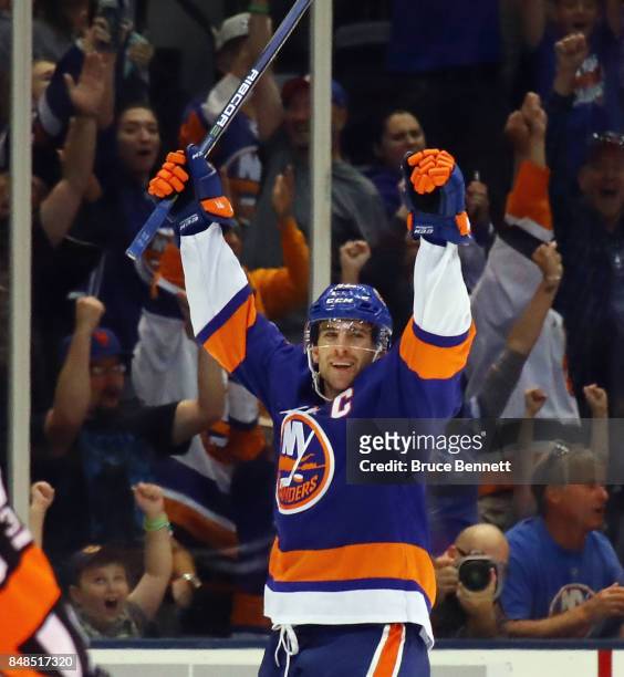 John Tavares of the New York Islanders celebrates his game winning goal at 34 seconds of overtime against the Philadelphia Flyers during a preseason...