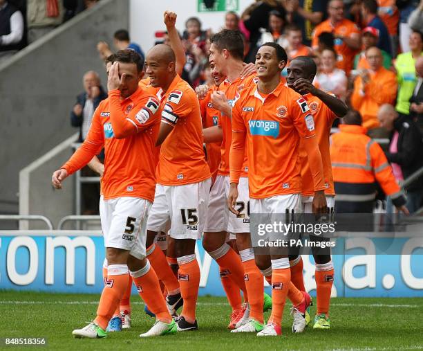 Blackpool's Craig Cathcart celebrates scoring his sides fifth goal of the game with team-mates during the npower Football League Championship match...