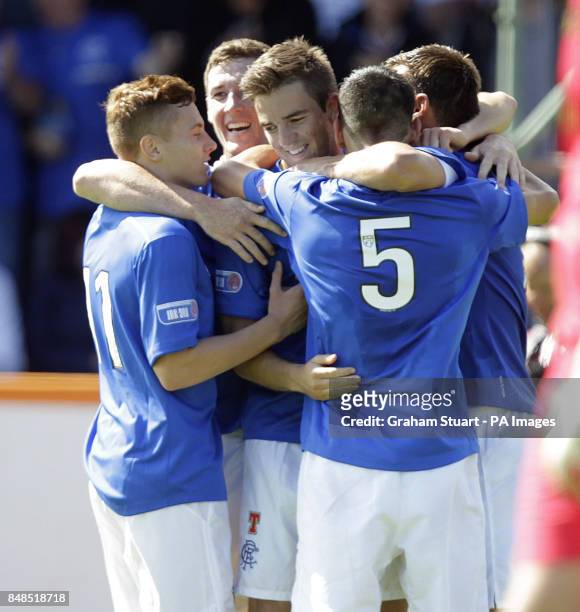 Rangers' Andrew Little celebrates scoring their first goal with team-mates Lewis McLeod and Lee McCulloch during the Scottish Division 3 match at...