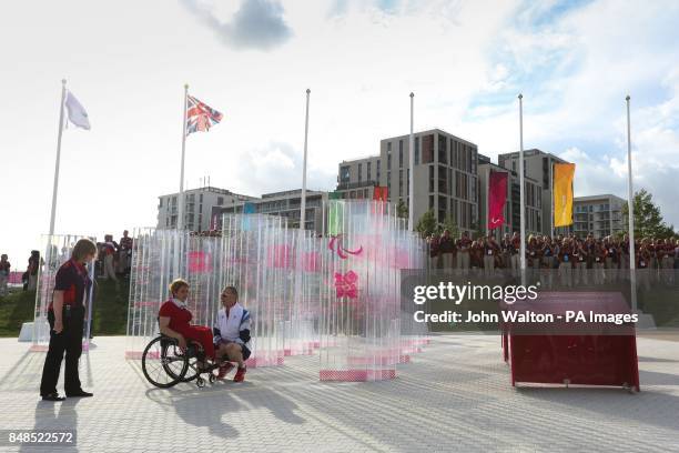 Great Britain's Chef de Mission Craig Hunter is welcomed to the Paralympic Village by Dame Tanni Grey Thompson, Paralympic village, London.