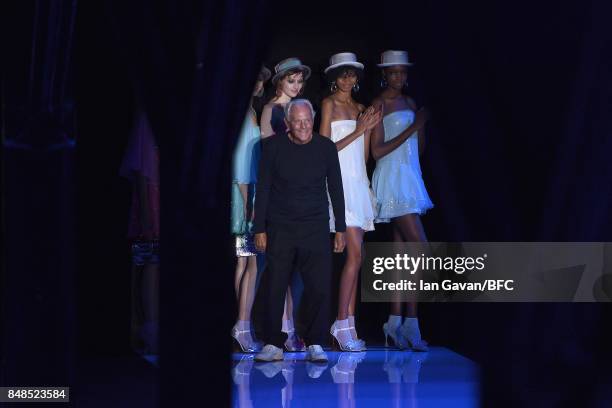 Fashion designer Giorgio Armani and models are seen on the runway during the finale of the Emporio Armani show at London Fashion Week September 2017...