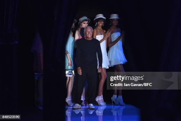 Fashion designer Giorgio Armani and models are seen on the runway during the finale of the Emporio Armani show at London Fashion Week September 2017...
