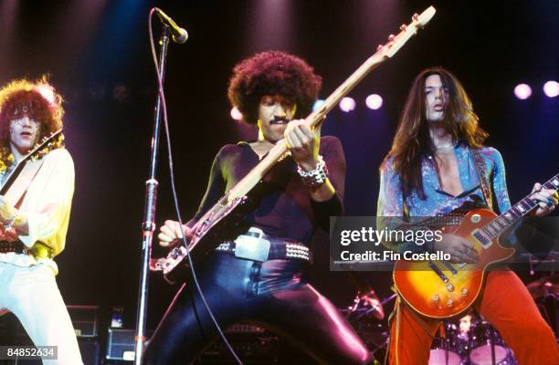 Photo of THIN LIZZY and Scott GORHAM and Phil LYNOTT and Brian ROBERTSON, L-R: Brian Robertson, Phil Lynott, Scott Gorham performing live onstage