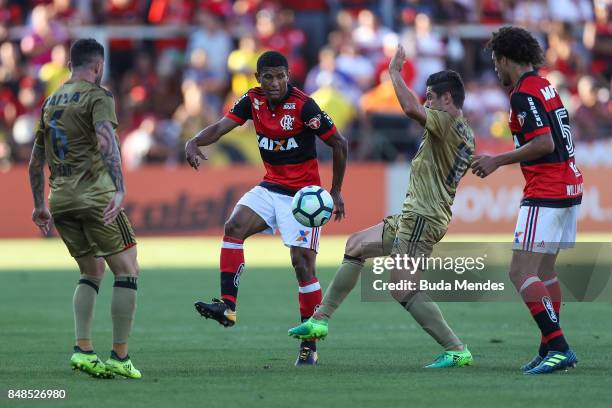 Marcio Araujo of Flamengo struggles for the ball with a players of Sport Recife during a match between Flamengo and Sport Recife as part of...