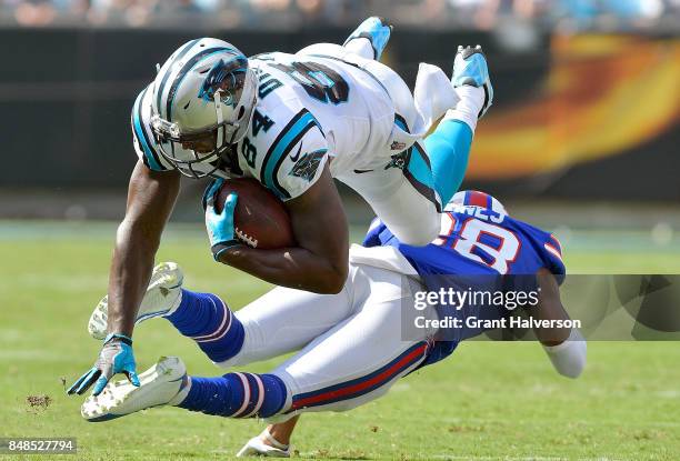 Gaines of the Buffalo Bills upends Ed Dickson of the Carolina Panthers during their game at Bank of America Stadium on September 17, 2017 in...