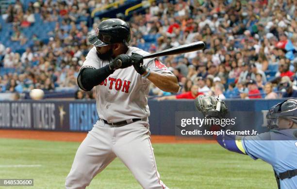 Jackie Bradley Jr. #19 of the Boston Red Sox takes a pitch during the second inning of the game against the Tampa Bay Rays at Tropicana Field on...