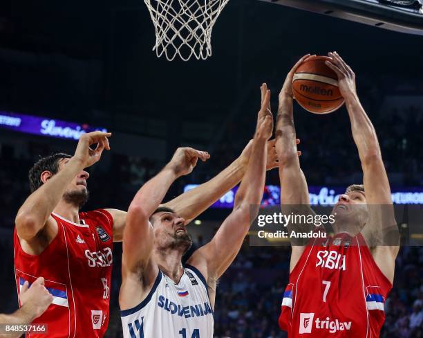 Gasper Vidmar of Slovenia in action against Bogdan Bogdanovic and Boban Marjanovic of Serbia during the FIBA Eurobasket 2017 final basketball match...