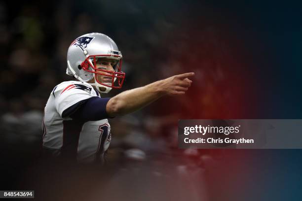 Tom Brady of the New England Patriots reacts to a penalty against the New Orleans Saints at the Mercedes-Benz Superdome on September 17, 2017 in New...