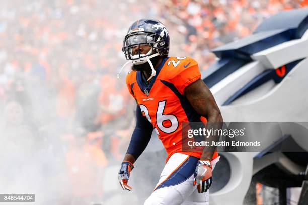 Free safety Darian Stewart of the Denver Broncos runs onto the field during player introductions before a game against the Dallas Cowboys at Sports...