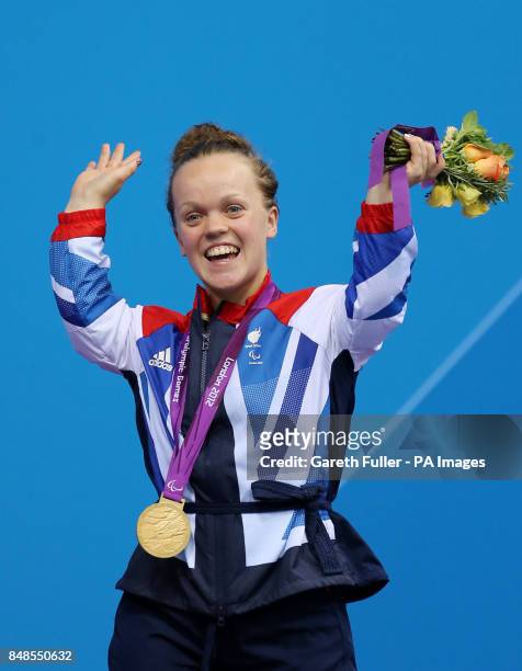 Great Britain's Eleanor Simmonds celebrates with her Gold Medal after winning the Women's 200m IM - SM6 at the Aquatics Centre, London.