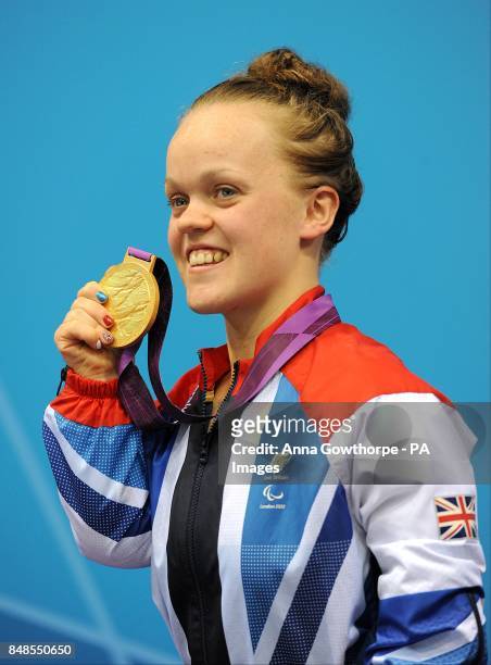 Great Britain's Eleanor Simmonds on the podium with her gold medal after victory in the Women's 200m Ind. Medley - SM6 final at the Aquatics Centre...