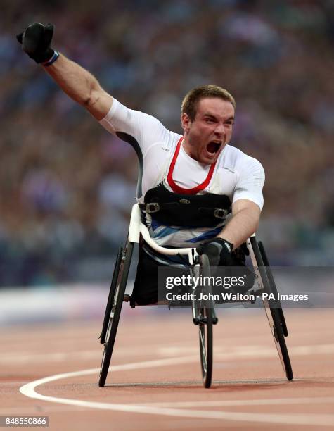 Great Britain's Mickey Bushell celebrates winning Gold during the Men's 100m - T53 at the Olympic Stadium, London.