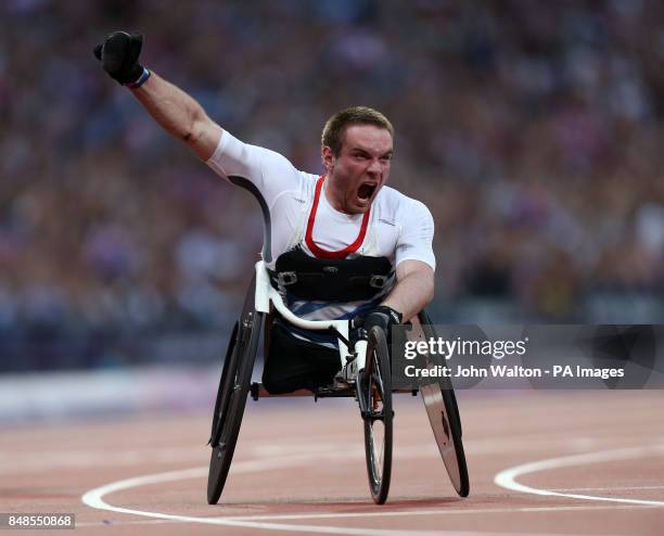 Great Britain's Mickey Bushell celebrates winning Gold in the Mens 100m - T53 at the Olympic Stadium, London.