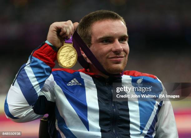 Great Britain's Mickey Bushell celebrates winning Gold in the Mens 100m - T53 at the Olympic Stadium, London.