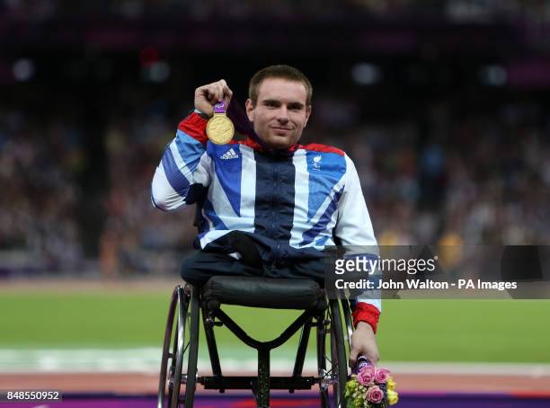Great Britain's Mickey Bushell celebrates winning Gold in the Mens 100m - T53 at the Olympic Stadium, London.