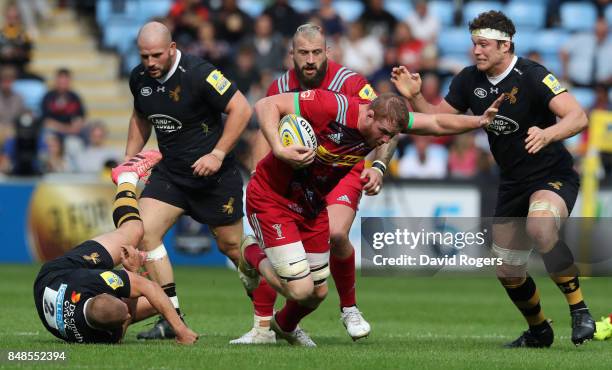 George Merrick of Harlequins charges upfield during the Aviva Premiership match between Wasps and Harlequins at The Ricoh Arena on September 17, 2017...