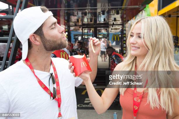 Devin Antin and Lauren Bushnell attend McDonald's celebrates Buttermilk Crispy Tenders on race day at the Chicagoland Speedway on September 17, 2017...