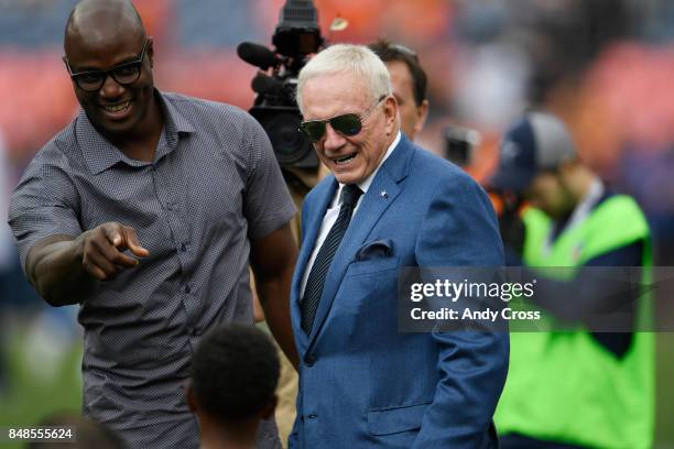 Dallas Cowboys owner Jerry Jones chops it up with former Cowboys and Denver Broncos great DeMarcus Ware before the first quarter on Sunday, September...