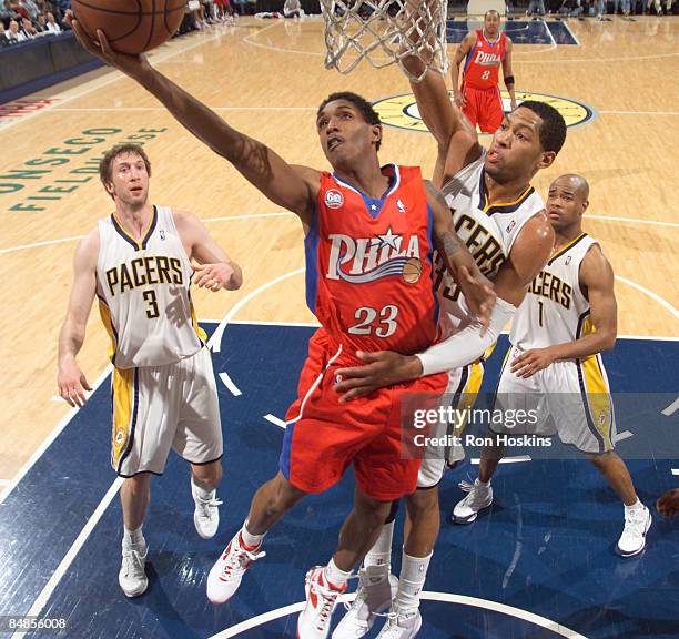 Lou Williams of the Philadelphia 76ers lays the ball up on Danny Granger of the Indiana Pacers at Conseco Fieldhouse on February 17, 2009 in...