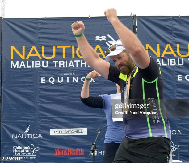 Actor David Denman participates in the Nautica Malibu Triathlon at Zuma Beach on September 17, 2017 in Malibu, California.