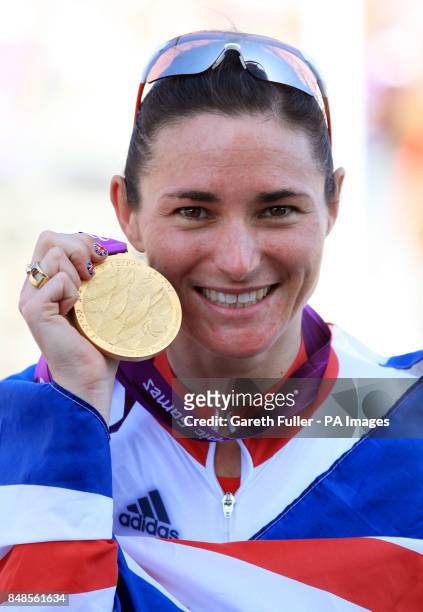 Great Britain's Sarah Storey celebrates with her Gold Medal following victory in the Women's Individual C5 Time Trial at Brands Hatch, Kent.