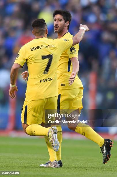 Pablo Perez of Boca Juniors celebrates with teammate Cristian Pavon after scoring the first goal of his team during a match between Boca Juniors and...