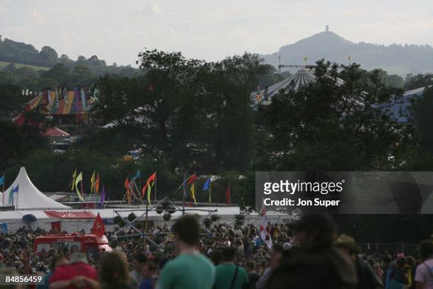 Photo of GLASTONBURY, view of Glastobury Tor in the distance behind the festival site at Glastonbury Festival, festivals