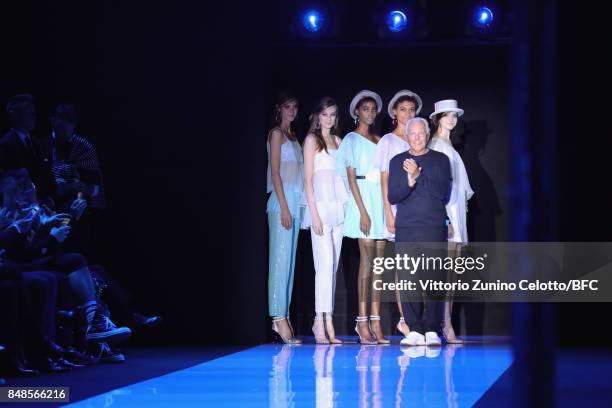 Fashion designer Giorgio Armani and models are seen on the runway during the finale of the Emporio Armani show at London Fashion Week September 2017...