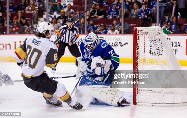 Tyler Wong of the Vegas Golden Knights scores against goalie Richard Backman of the Vancouver Canucks in NHL pre-season action on September 17, 2017...