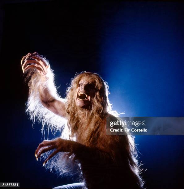 Photo of Ozzy OSBOURNE; posed, studio, dressed as werewolf, during 'Bark At The Moon' album cover shoot