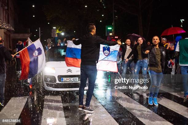 Fans celebrating in Ljubljana, Slovania, on September 17, 2017 after Slovenian basketball team historical win in European Championship in Istanbul on...