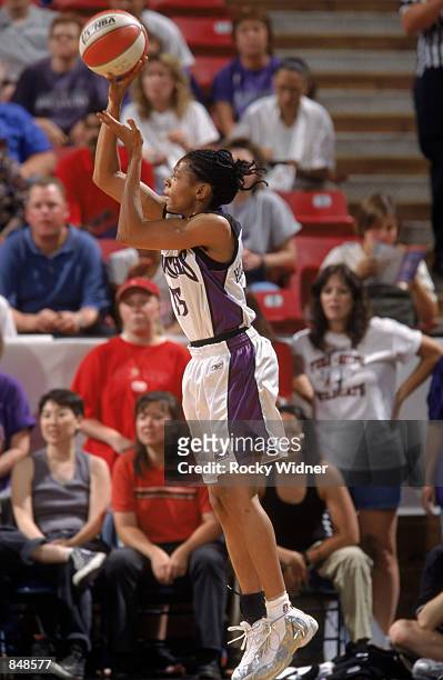 Kedra Holland-Corn of the Sacramento Monarchs shoots a jump shot during the WNBA game against the Seattle Storm on June 20, 2002 at Arco Arena in...
