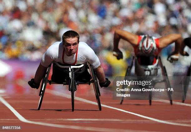 Great Britain's Mickey Bushell in action during round 1 of the Men's 200m - T53 at the Olympic Stadium, London.