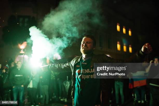 Fans celebrating in Ljubljana, Slovania, on September 17, 2017 after Slovenian basketball team historical win in European Championship in Istanbul on...