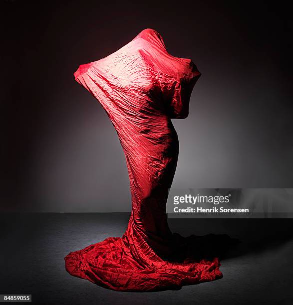 woman wrapped in red cloth 2 - crystalists stock pictures, royalty-free photos & images